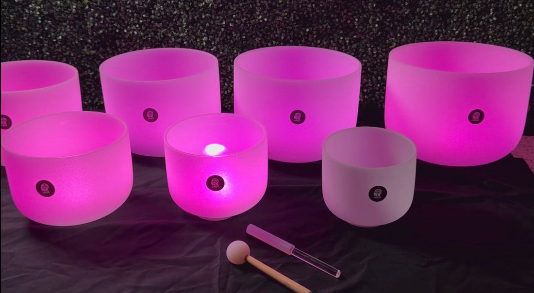 Crystal singing bowls glowing softly